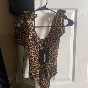 cheetah print body suit - never worn